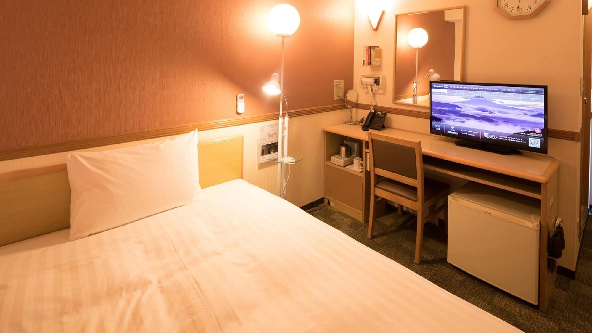Toyoko Inn Matsuyama Ichibancho Zimmer foto